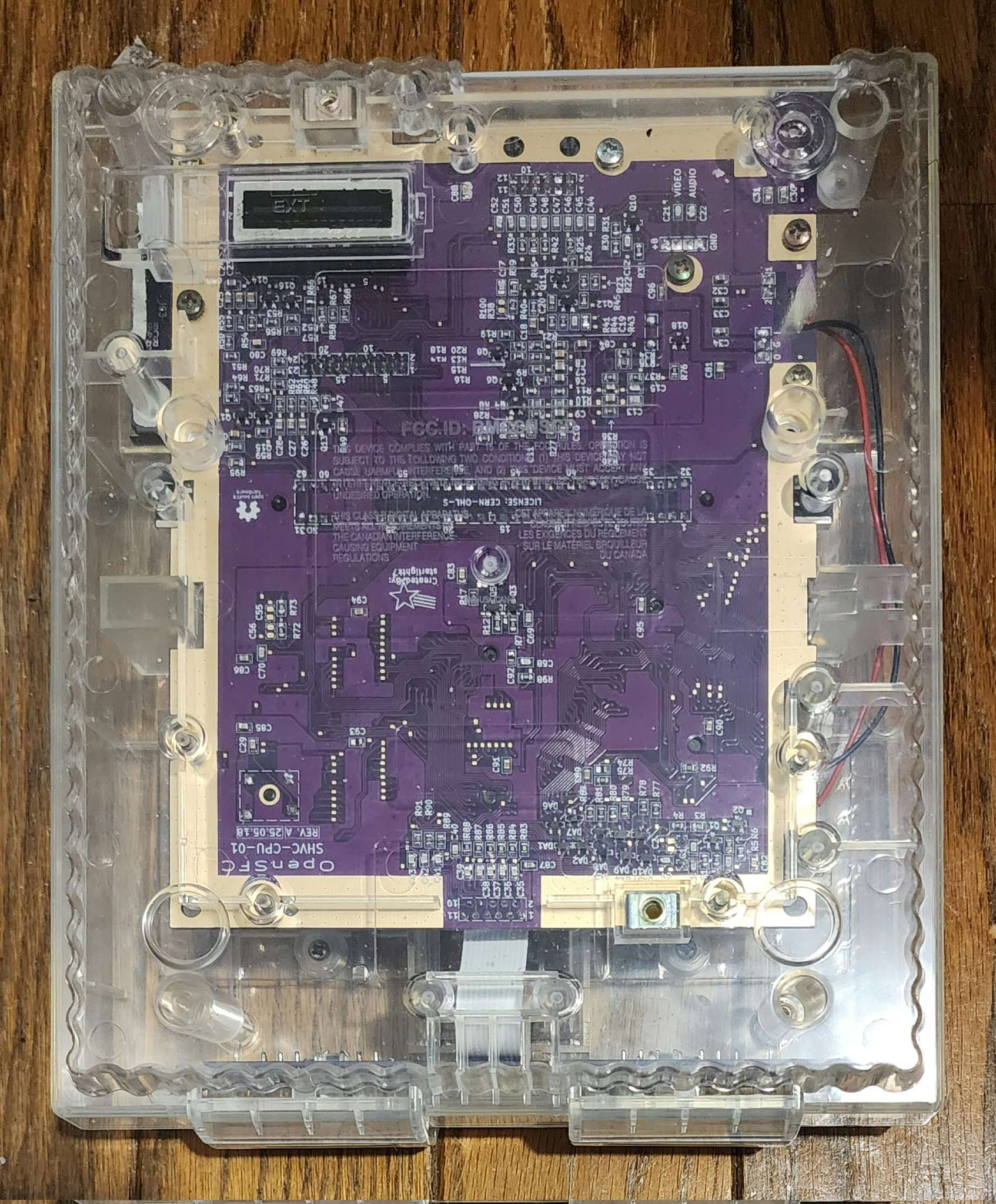 OpenSFC SHVC-CPU-01 purple build assembled in a clear case.